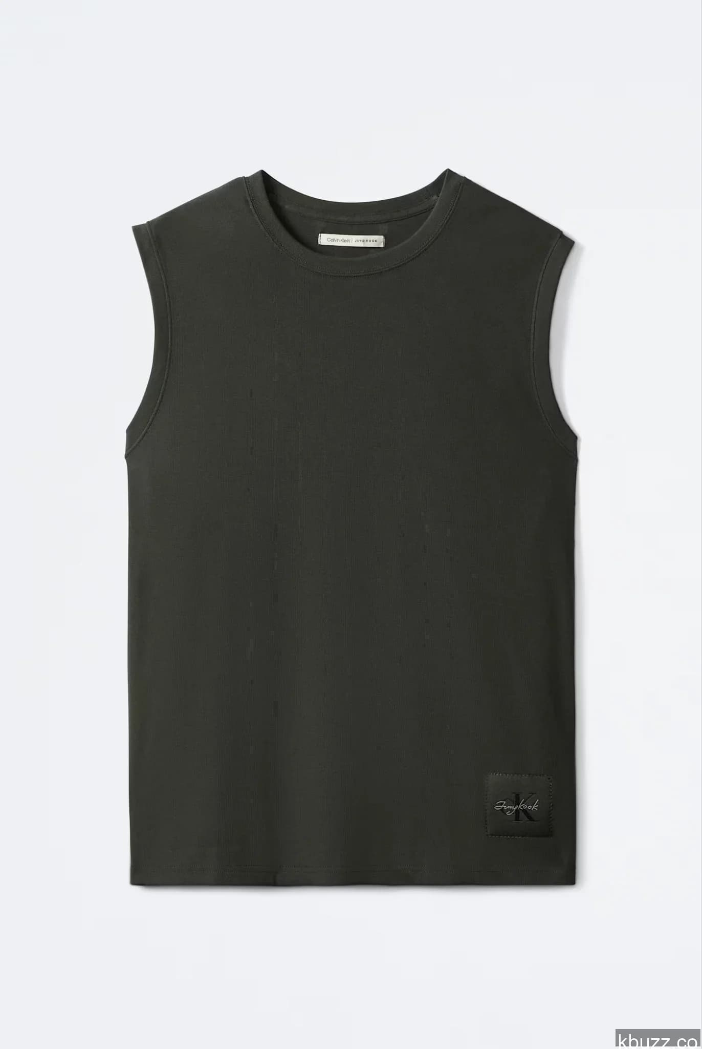 Olive sleeveless muscle top with a small woven "Jungkook K" patch at the hem